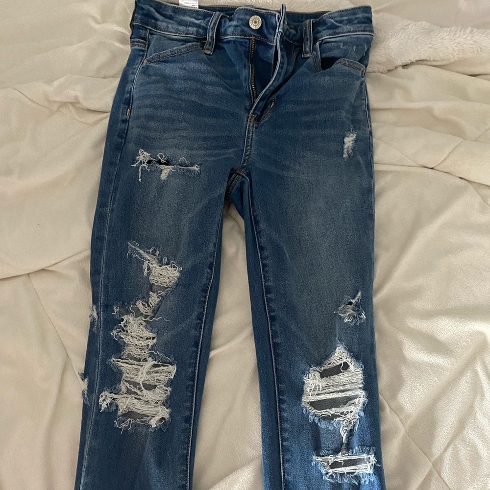 ripped jeans, never worn